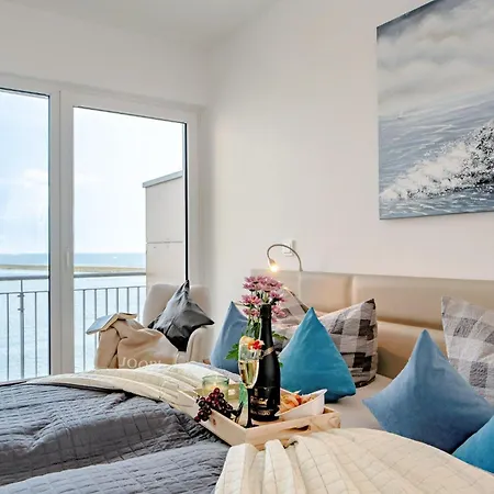 Fewo-kleine-auszeit-by-seeblick-ferien-oro-direkter-wasserblick-am-strand * Olpenitz