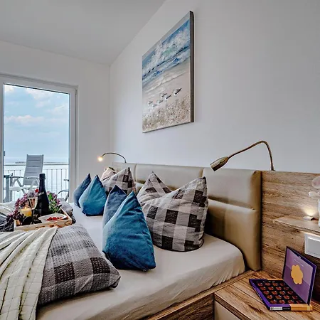 Fewo-kleine-auszeit-by-seeblick-ferien-oro-direkter-wasserblick-am-strand *