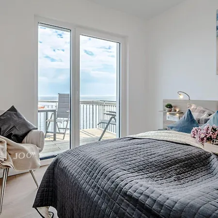 Fewo-kleine-auszeit-by-seeblick-ferien-oro-direkter-wasserblick-am-strand Apartmán